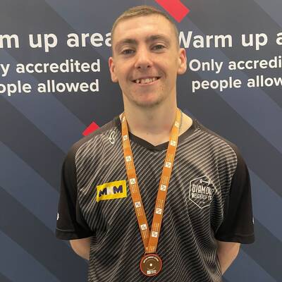 Coleg Llandrillo student Seamus Thomas with his bronze medal at the British Weightlifting Age Group Championships