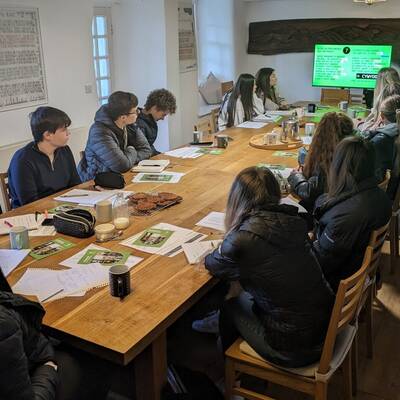 Poet Rhys Iorwerth talking to Coleg Meirion-Dwyfor A-level students at Tŷ Newydd National Writing Centre